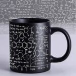 Black mug with scientific formulas and chemical structures, perfect for science enthusiasts and students.