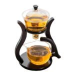 High-quality glass coffee maker with a wooden stand, featuring a glass pot and lid, perfect for brewing and serving fresh coffee with a scientific aesthetic.