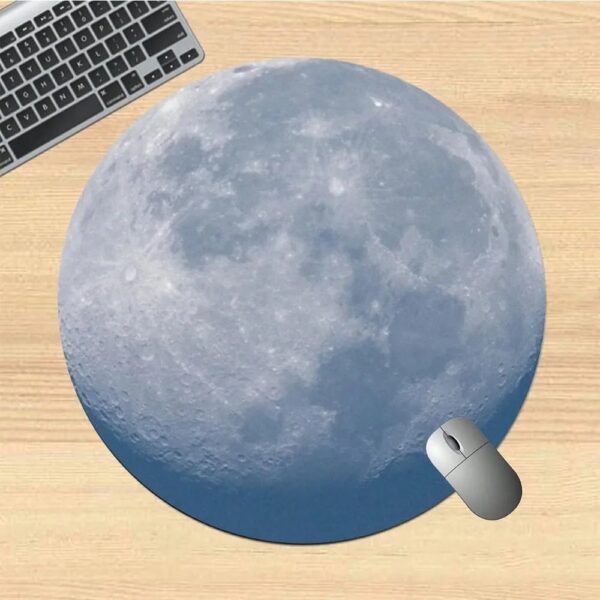 Realistic moon surface design mouse pad for desk decor and comfort.