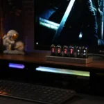 Interactive Nixie Tube Clock Display on a Desk.