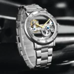 A sophisticated skeleton mechanical watch showcasing intricate internal gears and a sleek silver band, perfect for science and engineering enthusiasts.
