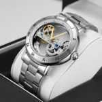 Elegant skeleton mechanical watch showcasing intricate gears and a silver band, perfect for watch enthusiasts and collectors.
