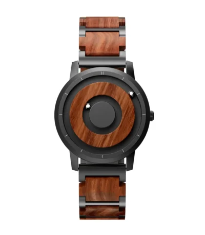 A stylish wooden wristwatch with a minimalist design, featuring a round face and a combination of wood and metal materials. Perfect for science enthusiasts and fashion-forward individuals.