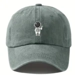 Gray baseball cap featuring a cute astronaut graphic, perfect for science enthusiasts and space lovers. Made from comfortable fabric, ideal for casual wear and educational activities.