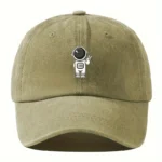 Khaki baseball cap featuring a cute cartoon astronaut patch, perfect for science enthusiasts and space lovers. Made of durable fabric with adjustable strap for a comfortable fit.
