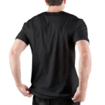Man wearing a plain black T-shirt, viewed from the back, with short brown hair and casual stance.