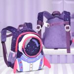 Backpack featuring a colorful astronaut and galaxy design, perfect for children interested in space and science. Durable, lightweight, and ideal for school or travel.