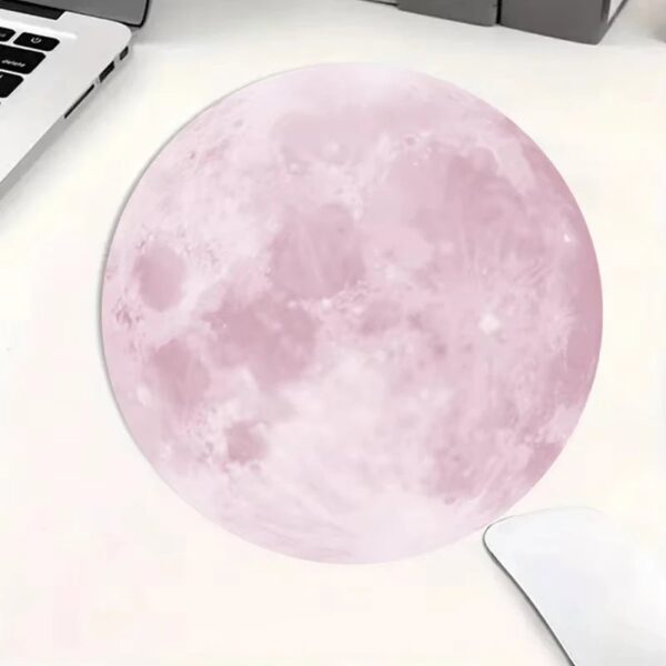 Realistic pink moon lamp on a white surface, perfect for science decor and educational spaces.