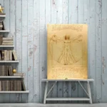 Classic Vitruvian Man drawing by Leonardo da Vinci on aged parchment, displayed on a rustic wooden wall with a small white table. Perfect for science and art enthusiasts.