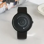 Modern wristwatch featuring a solar system-inspired design with orbiting planets on a black dial, perfect for science enthusiasts and educational purposes.