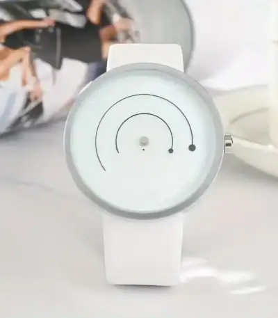 Modern minimalist white watch featuring a circular dial with black accents and a sleek design, perfect for contemporary fashion and everyday wear.