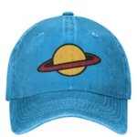 Bright blue baseball cap with a yellow and red planet embroidery design on the front.
