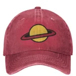 Stylish baseball cap featuring a yellow planet with a black ring, perfect for space enthusiasts and casual wear.