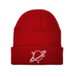 Red beanie hat with space-themed planet and star embroidery.