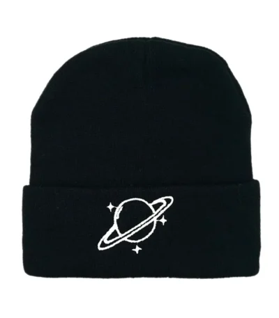 Black beanie hat featuring a white space planet with rings and stars, perfect for science enthusiasts and space lovers.