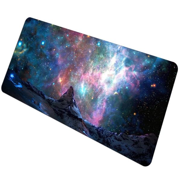 Space-themed desk mat featuring a vibrant galaxy with stars, nebulae, and mountain silhouettes, ideal for science enthusiasts and educational settings.
