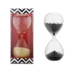 Modern sand timer with black and white swirling pattern, ideal for educational and decorative purposes.