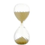 Clear glass sand timer with beige sand, ideal for science experiments, educational activities, and decor. Perfect for teaching time measurement and adding a scientific touch to any space.