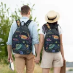 Two children with space-themed backpacks holding hands outdoors, showcasing fun and educational backpacks with planets and stars design for school or travel.