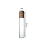 Clear glass test tube with a cork stopper, measuring 15.5 cm in height and 3 cm in diameter, ideal for science experiments and educational demonstrations.