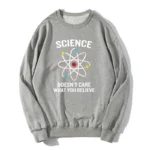 Pull scientifique avec motif atome et slogan inspirant.