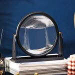 A magnetic levitation device demonstrating floating and spinning magnetic objects, showcasing principles of magnetism and physics for educational purposes.