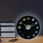 Modern moon phase wall clock showing lunar cycle phases, perfect for educational decor and science-themed rooms.