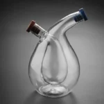 An elegant glass laboratory container featuring two angled openings with colored caps, ideal for science experiments and educational demonstrations.