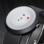 Interactive science watch with rotating arrow and colorful indicators, designed for educational purposes and modern decor.