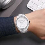 Modern paper watch featuring a minimalist design and quote, worn on a person's wrist, showcasing innovative and eco-friendly fashion accessories.