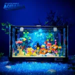 Educational underwater aquarium science kit featuring colorful fish, plants, and bubbles for kids' learning and play.