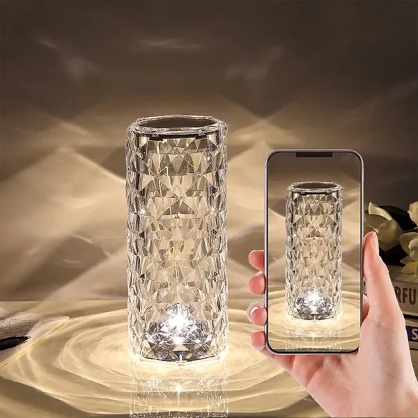 Decorative geometric glass vase with intricate faceted design, perfect for floral arrangements or as a stylish accent piece in modern interiors.