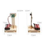 Educational electromagnetic motor experiment kit with battery holder, wires, and circuit board for science learning and STEM projects.