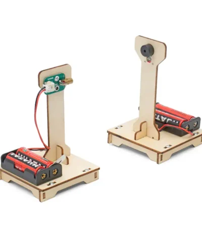 Educational DIY electric motor kit with wooden base, circuit components, and batteries, ideal for science projects and STEM learning.
