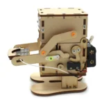 Wooden mechanical robot model with gears and levers, ideal for science education and STEM projects.