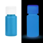 Small blue bottle of glow-in-the-dark paint that illuminates in the dark, ideal for science projects and educational activities.