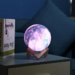 Illuminated 3D moon galaxy lamp with realistic lunar surface and vibrant colors, perfect for science decor and educational spaces.
