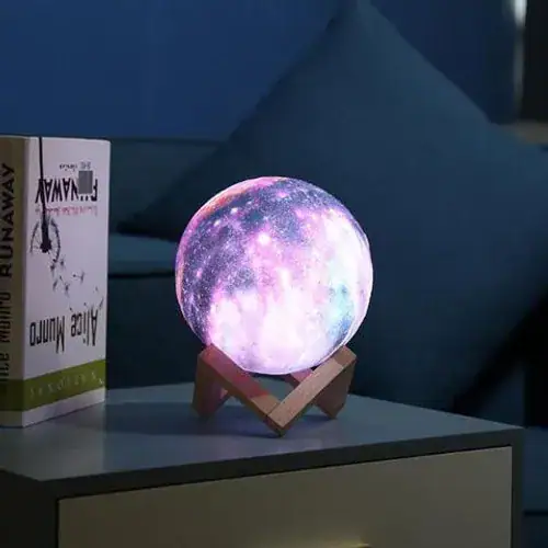 Illuminated 3D moon galaxy lamp with realistic lunar surface and vibrant colors, perfect for science decor and educational spaces.