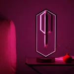 Stylish neon geometric lamp emitting pink light, perfect for modern home decor and creating a cozy ambiance.