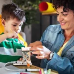 Educational science experiment kit for kids with a small robotic device.