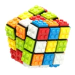 Colorful 3D cube made of interlocking plastic pieces resembling a Rubik's Cube, designed for educational and recreational use.