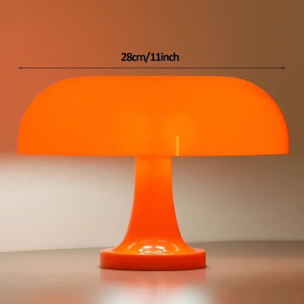 Bright orange mushroom-shaped LED lamp with a modern design, measuring 28cm (11 inches) in width.