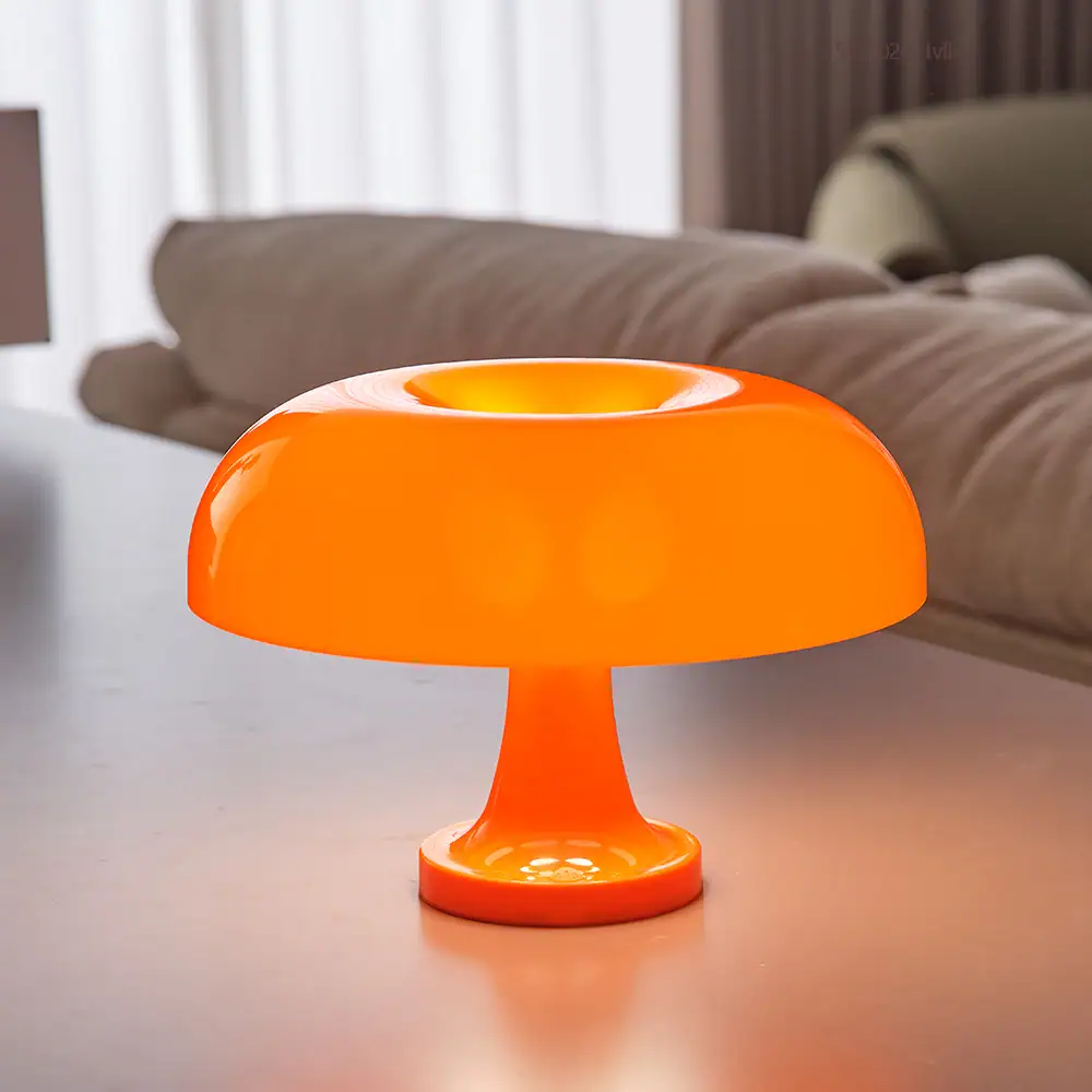 Modern Orange Table Lamp for Home Decor and Science Enthusiasts An orange, mushroom-shaped table lamp with a sleek, glossy finish, perfect for adding a vibrant touch to any room.