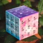 Colorful periodic table cube featuring chemical elements for educational and decorative purposes.