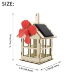 Small wooden windmill model with red blades and solar panel, ideal for educational science projects and renewable energy demonstrations.