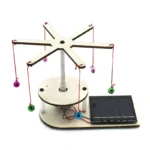 Solar-powered balancing toy with colorful hanging balls, demonstrating principles of physics and energy conversion.