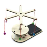 A balanced wooden kinetic sculpture with colorful hanging bells, demonstrating principles of physics and motion.