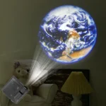 Earth projector night light projecting a detailed image of the planet Earth onto a wall.