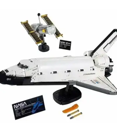 Detailed LEGO-style model of a NASA space shuttle with satellite, batteries, and informational cards, ideal for science education and space-themed decor.
