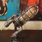 Steampunk-inspired science gadget with glass tube and metal pipes, perfect for science enthusiasts and educational displays.